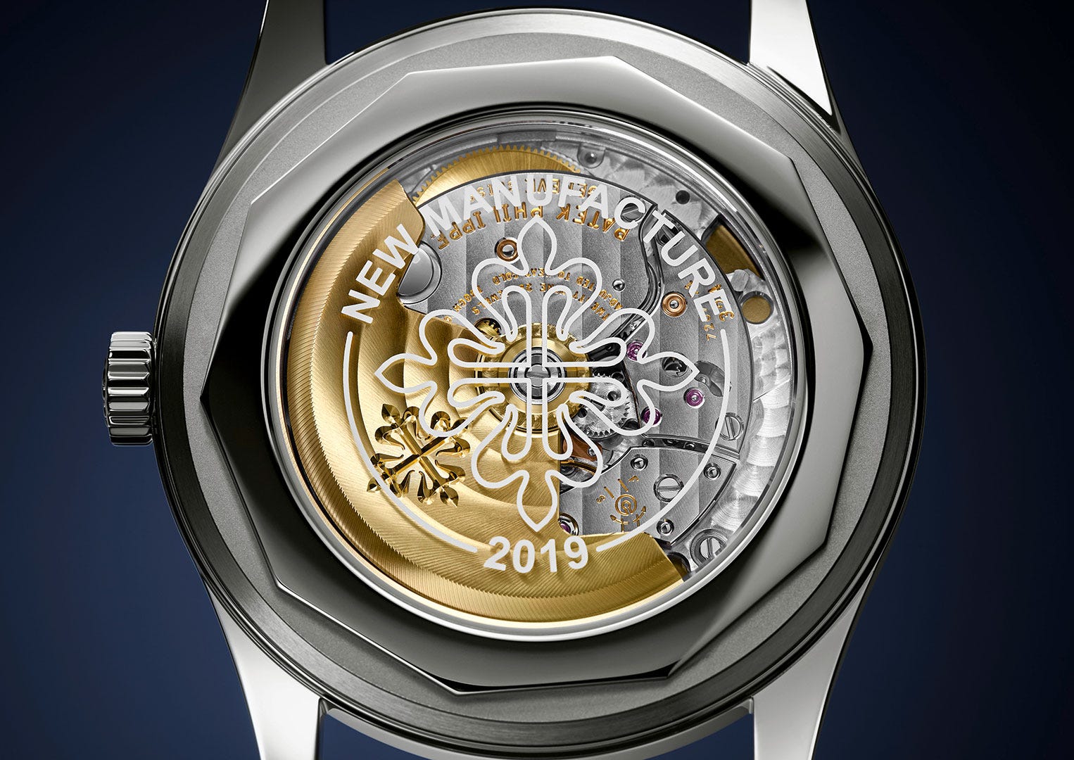 The self-winding movement of a Patek Philippe, with stunning gold rotor