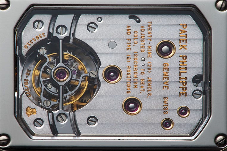 Only visible through the back, the tourbillon rotates once per minute